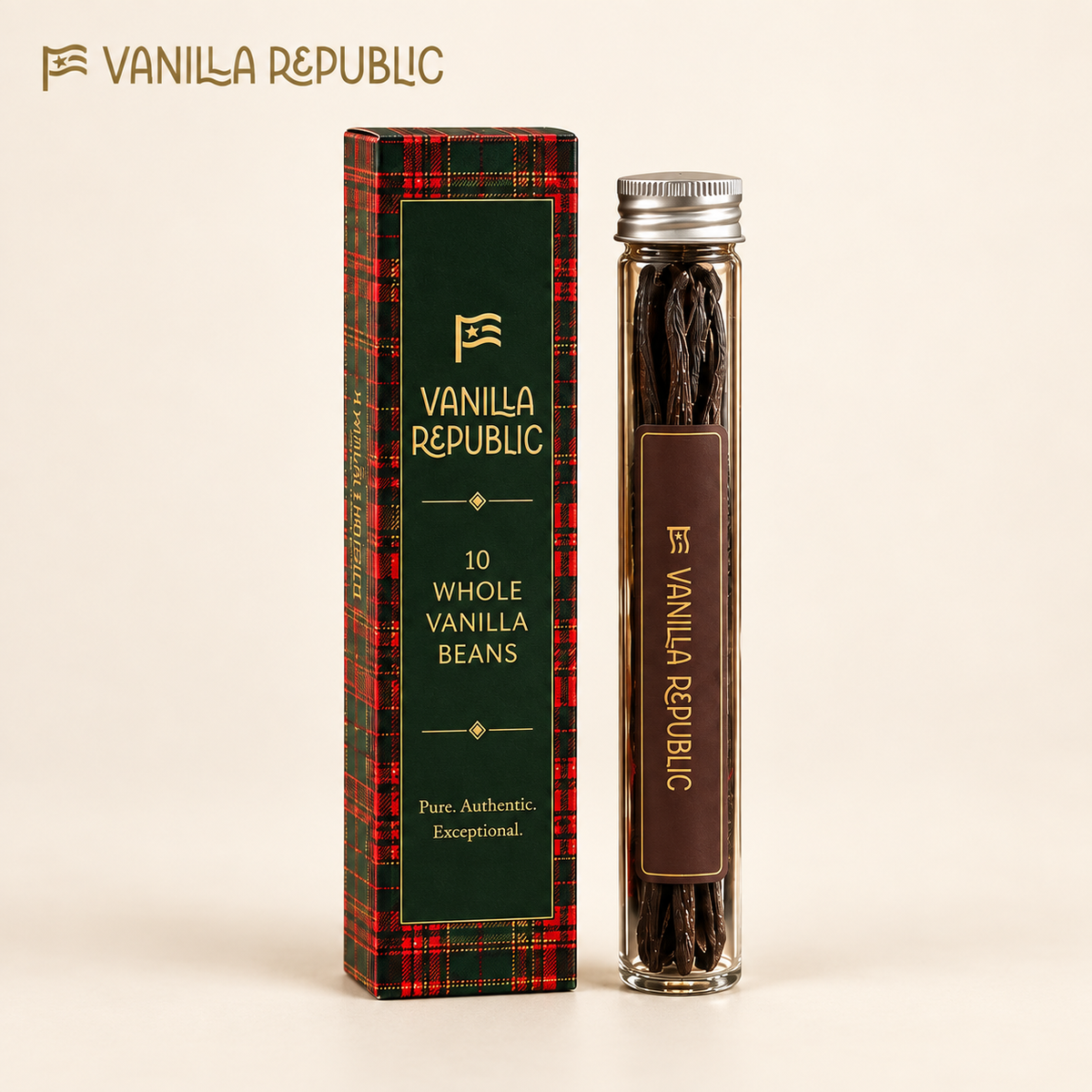 Vanilla Republic bean tube beside its tartan holiday carton on a warm cream background